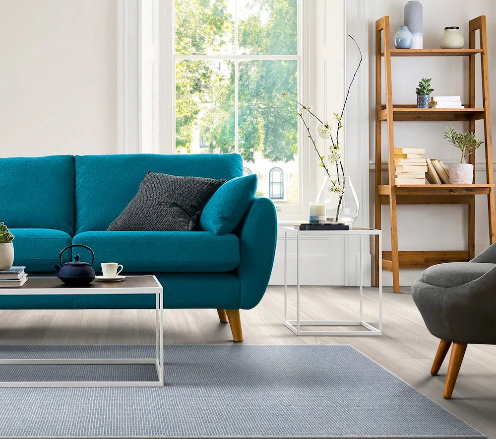 Blue Masland Seaview area rug beneath living room furniture