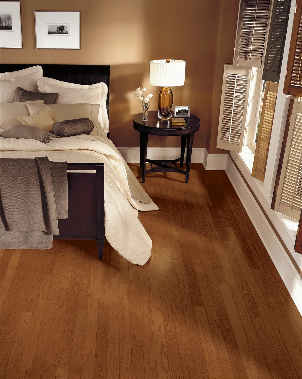 Bedroom with warm solid hardwood flooring