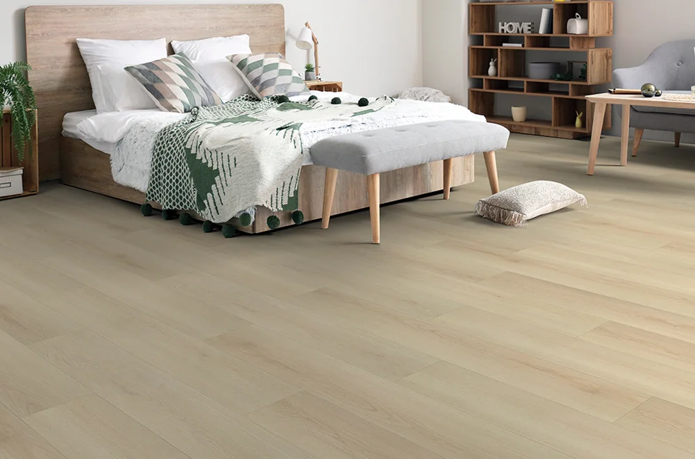 Light Torlys wood-look flooring in a bright bedroom